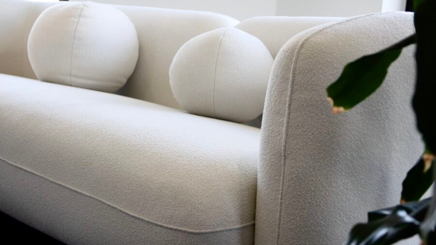 canape au design haut de gamme tissu beige bouclette